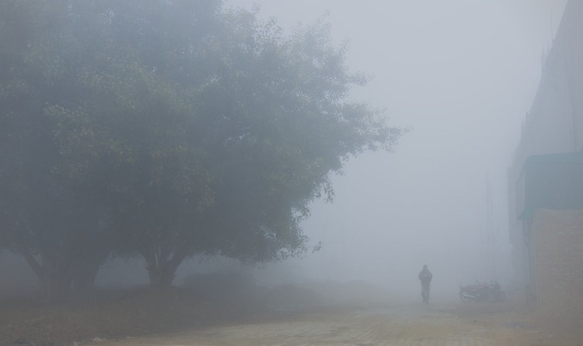 Walker in Delhi fog
